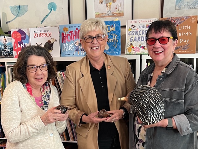 Judging the Cottesloe Mentorship for the CBCA in 2023 with Vivienne Nicoll-Hatton and Gail Erskine. The judges are all holding echidna statues.